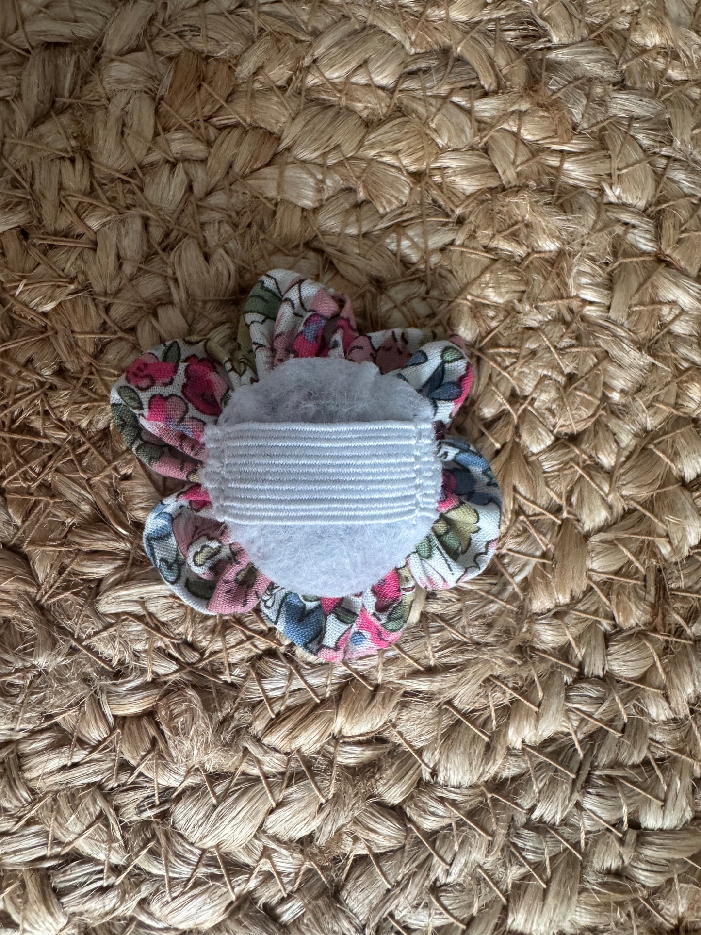 Dog collar flower - pink floral pattern showing elastic on the back